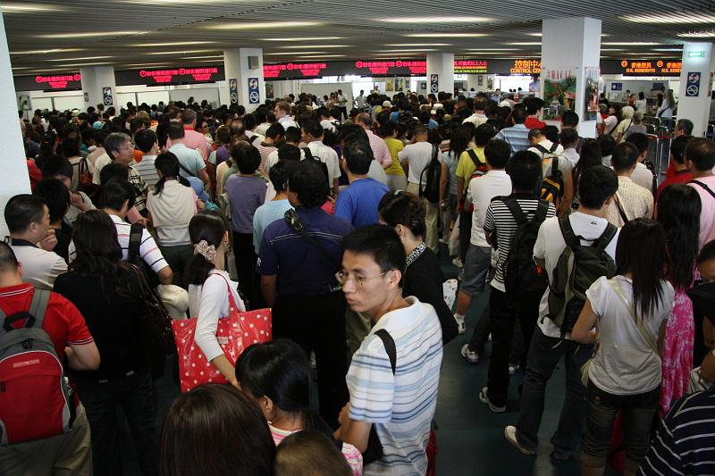 Macau_Immigration_Madness.jpg - Macau: Macau is a city western of Hong Kong. Beside Hong Kong it is the second city with the special status of an "Special adminstrative region", which means, different laws and rules to the rest of China.